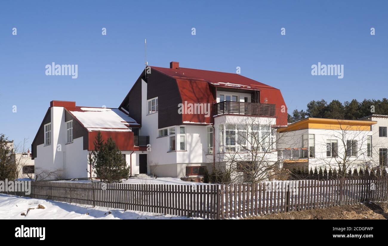 Modern European mass rural building Stock Photo