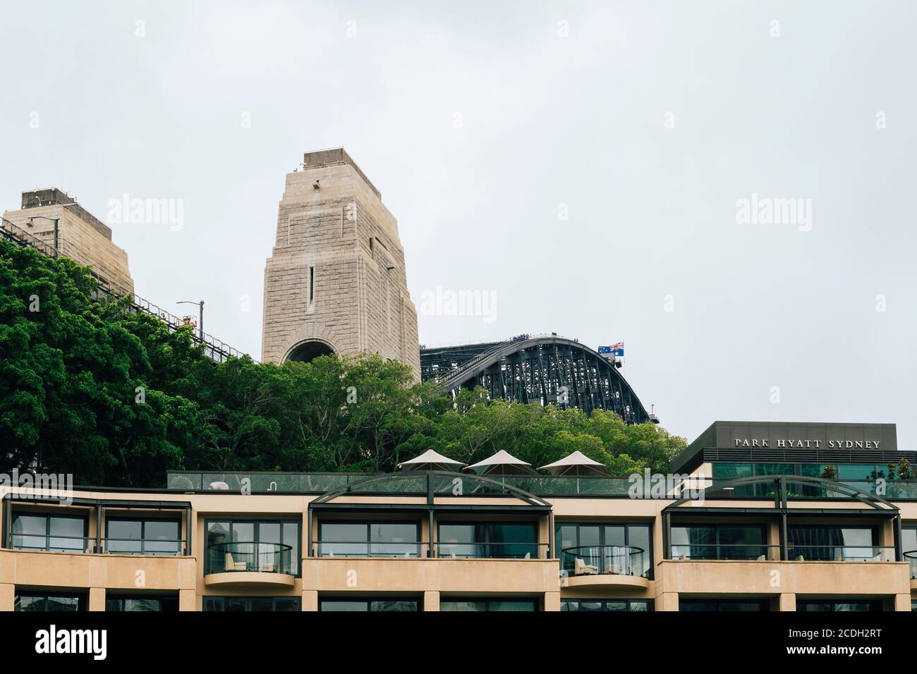 Exterior rooftop and balconies of the Park Hyatt Sydney in The Rocks by the iconic Sydney Harbour Bridge, Sydney, New South Wales, Australia Stock Photo