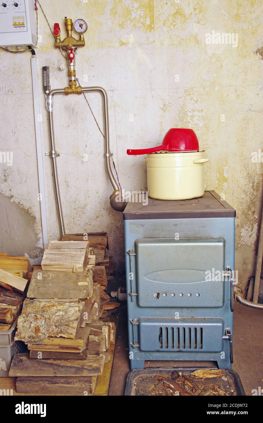 steel water boiler with a stove plate Stock Photo