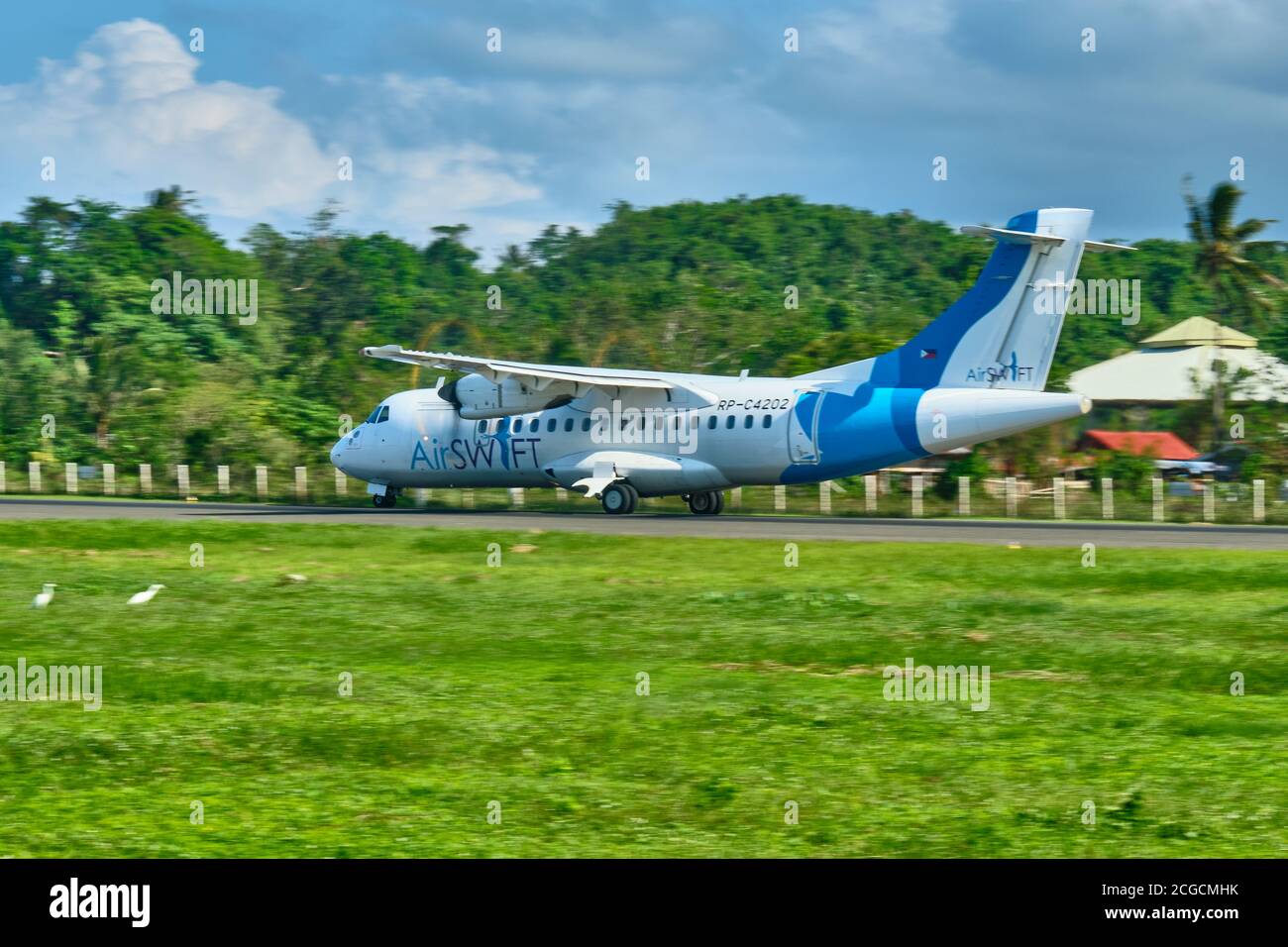 Boracay, Philippines - Jan 31, 2020: an ATR 42 aircraft with the tail number RP-C4202 AIRSWIFT is preparing to take off at Caticlan airport on Panay Stock Photo