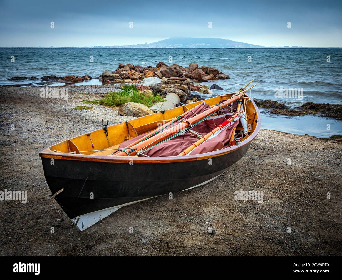 lonley boat on peaceful shore in france Stock Photo