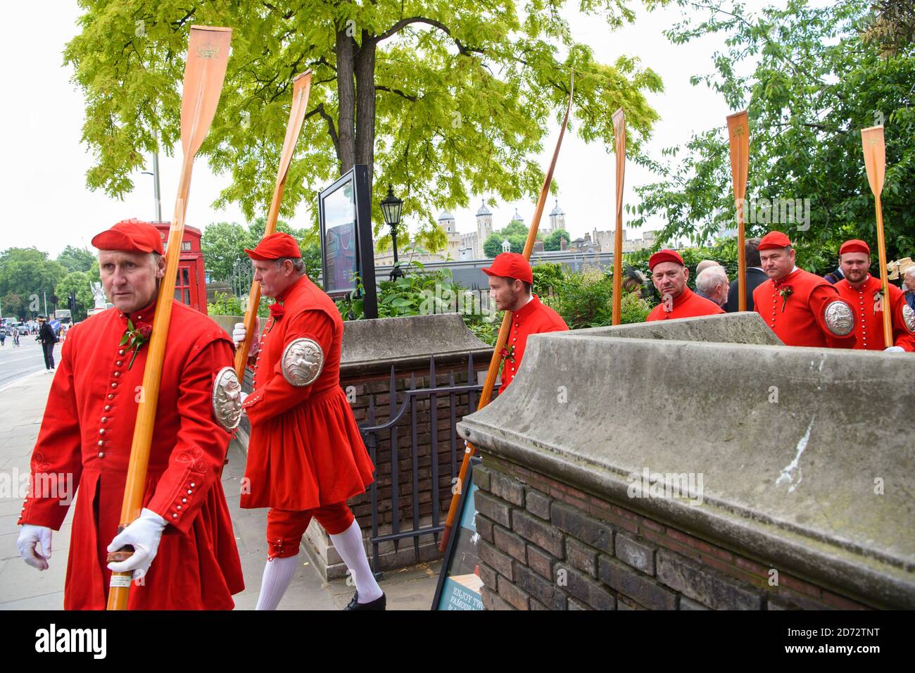 Members of the Company of Watermen and Lightermen of the River Thames leave the churchyard of All Hallows by the Tower in London, during the Knolly's Rose Ceremony. The ceremony, which dates back to 1381, sees a peppercorn rent of a single rose being paid annually to the Lord Mayor, after  soldier Sir Robert Knollys of Seething Lane built an illegal footbridge over the road to his rose garden. Picture date: Wednesday 20th June, 2018. Photo credit should read: Matt Crossick/ EMPICS Entertainment. Stock Photo