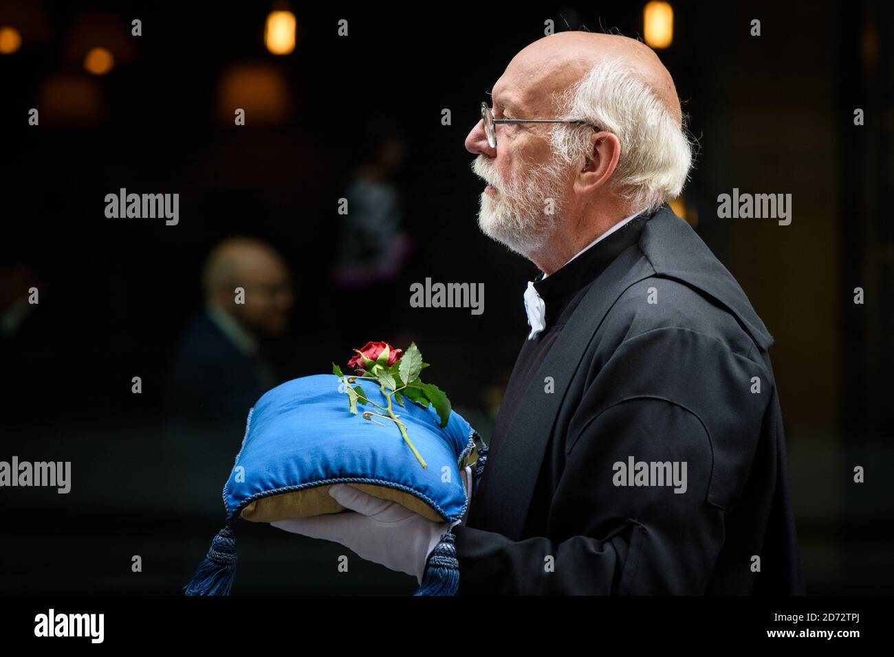 Members of the Company of Watermen and Lightermen of the River Thames, and members of the church of All Hallows by the Tower, carry a rose through the City of London during the Knolly's Rose Ceremony. The ceremony, which dates back to 1381, sees a peppercorn rent of a single rose being paid annually to the Lord Mayor, after  soldier Sir Robert Knollys of Seething Lane built an illegal footbridge over the road to his rose garden. Picture date: Wednesday 20th June, 2018. Photo credit should read: Matt Crossick/ EMPICS Entertainment. Stock Photo