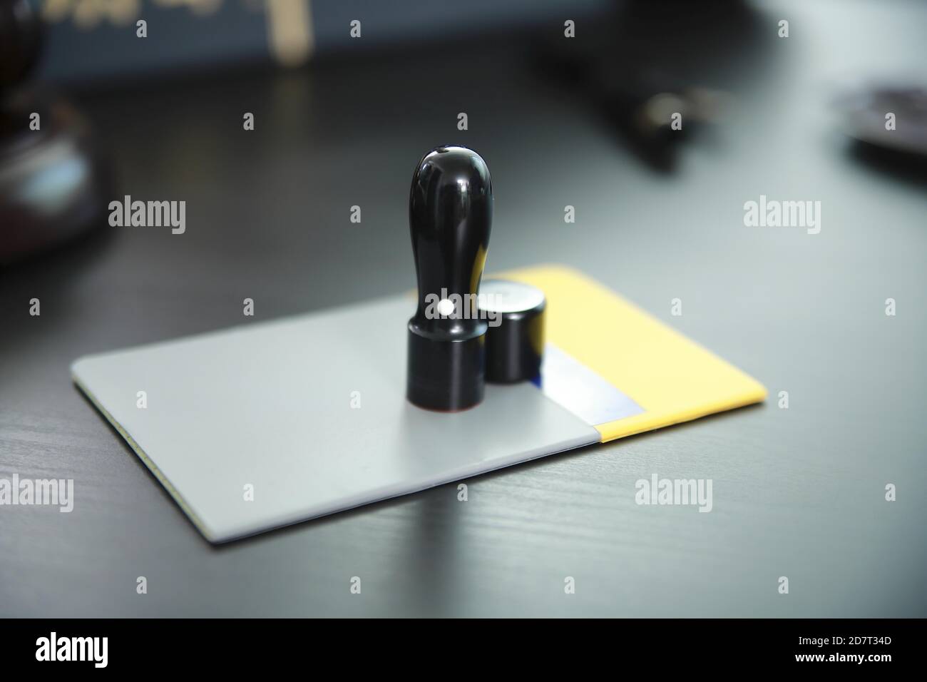 Bank book with stamp on desk Stock Photo