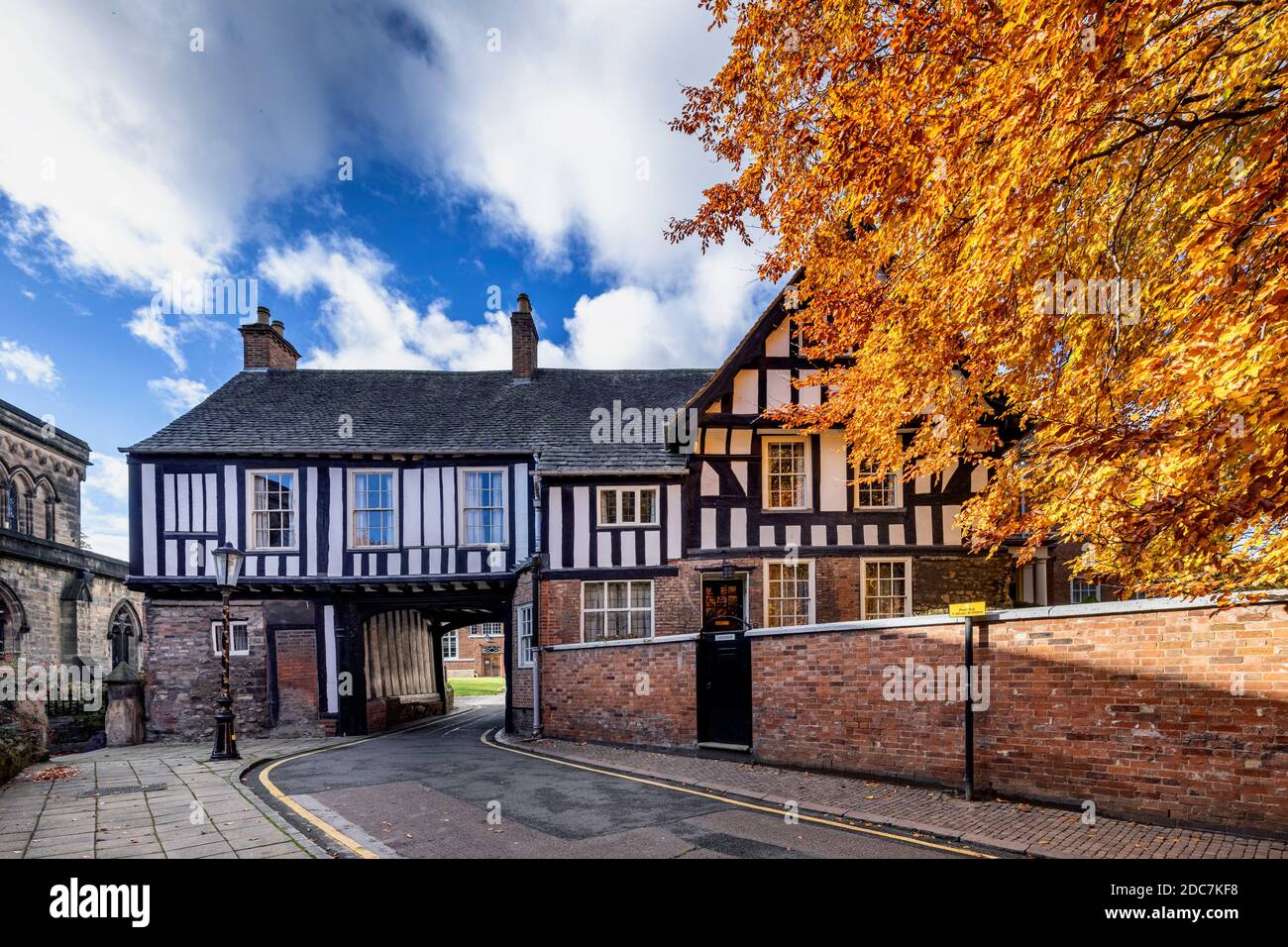 The medieval timbered Castle Gate House (dating from the 15th century, 1445) with a road passing underneath in Leicester Stock Photo