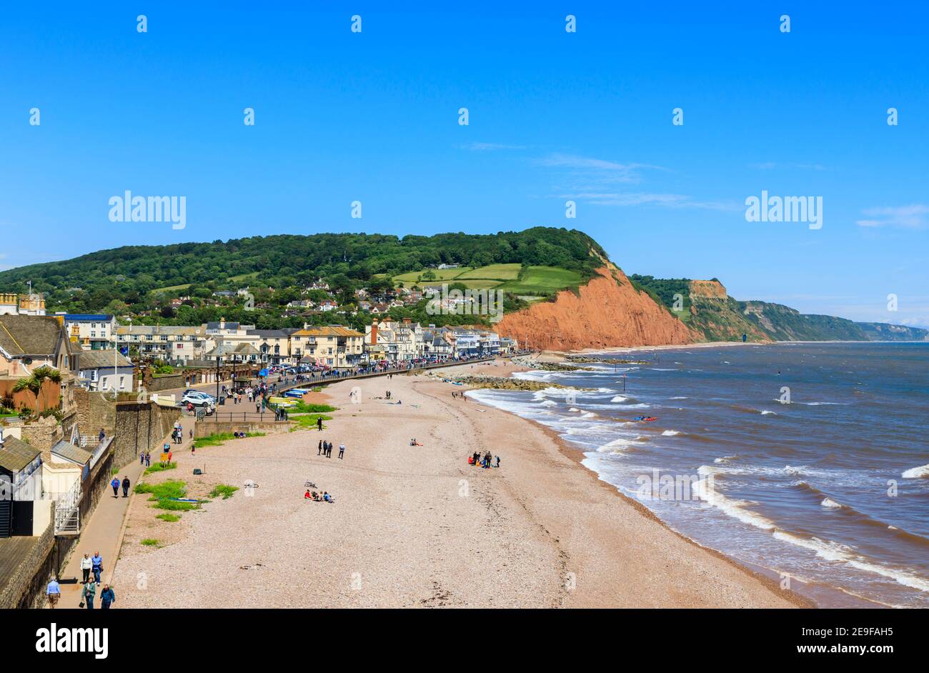 View looking east to Salcombe Hill over the sea, beach and coastline of Sidmouth, a popular south coast seaside town in Devon, south-west England Stock Photo