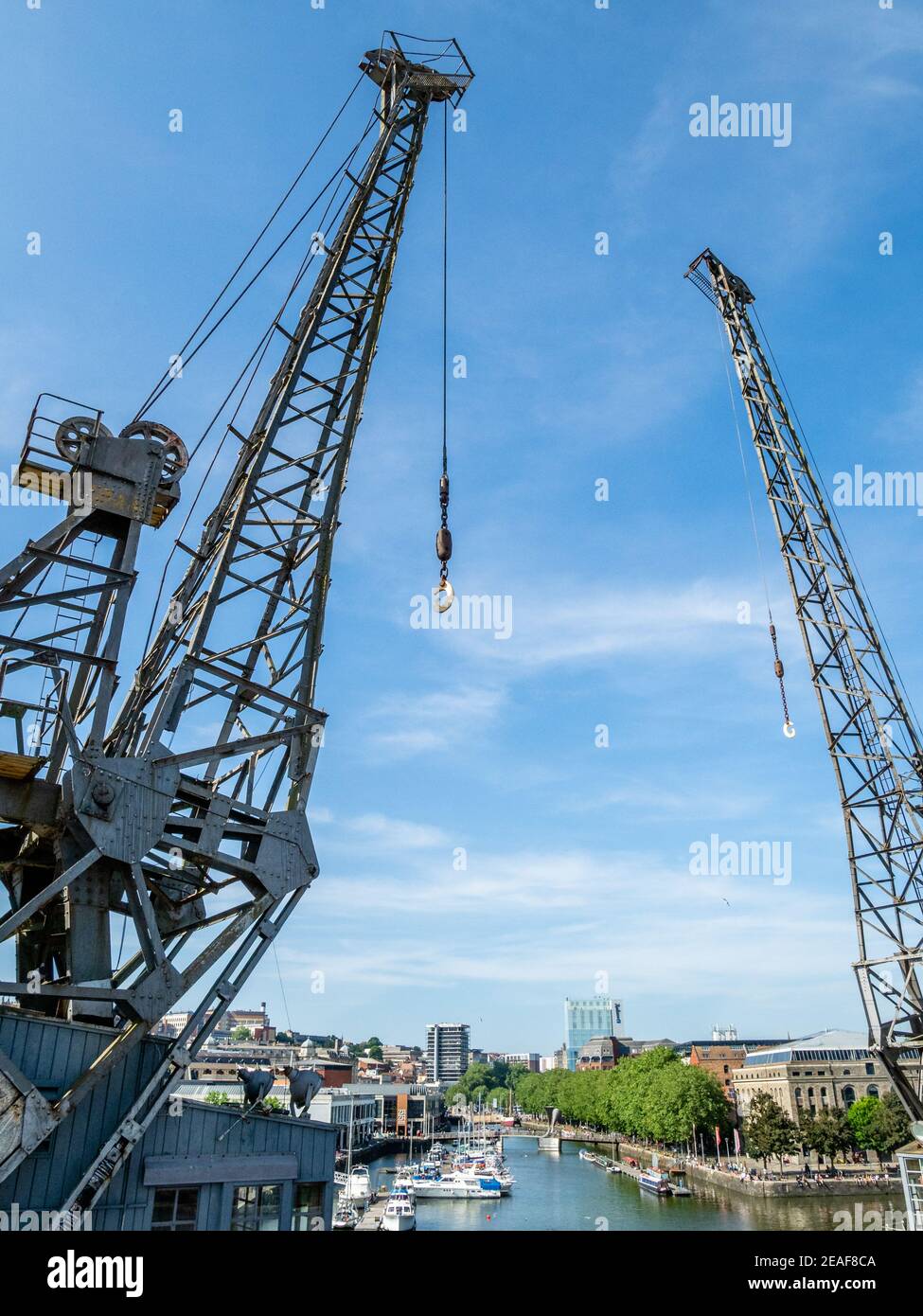 The Bristol Cranes beside the M-Shed on Bristol's harbourside UK - reminders of the city's once thriving role as a sea port Stock Photo