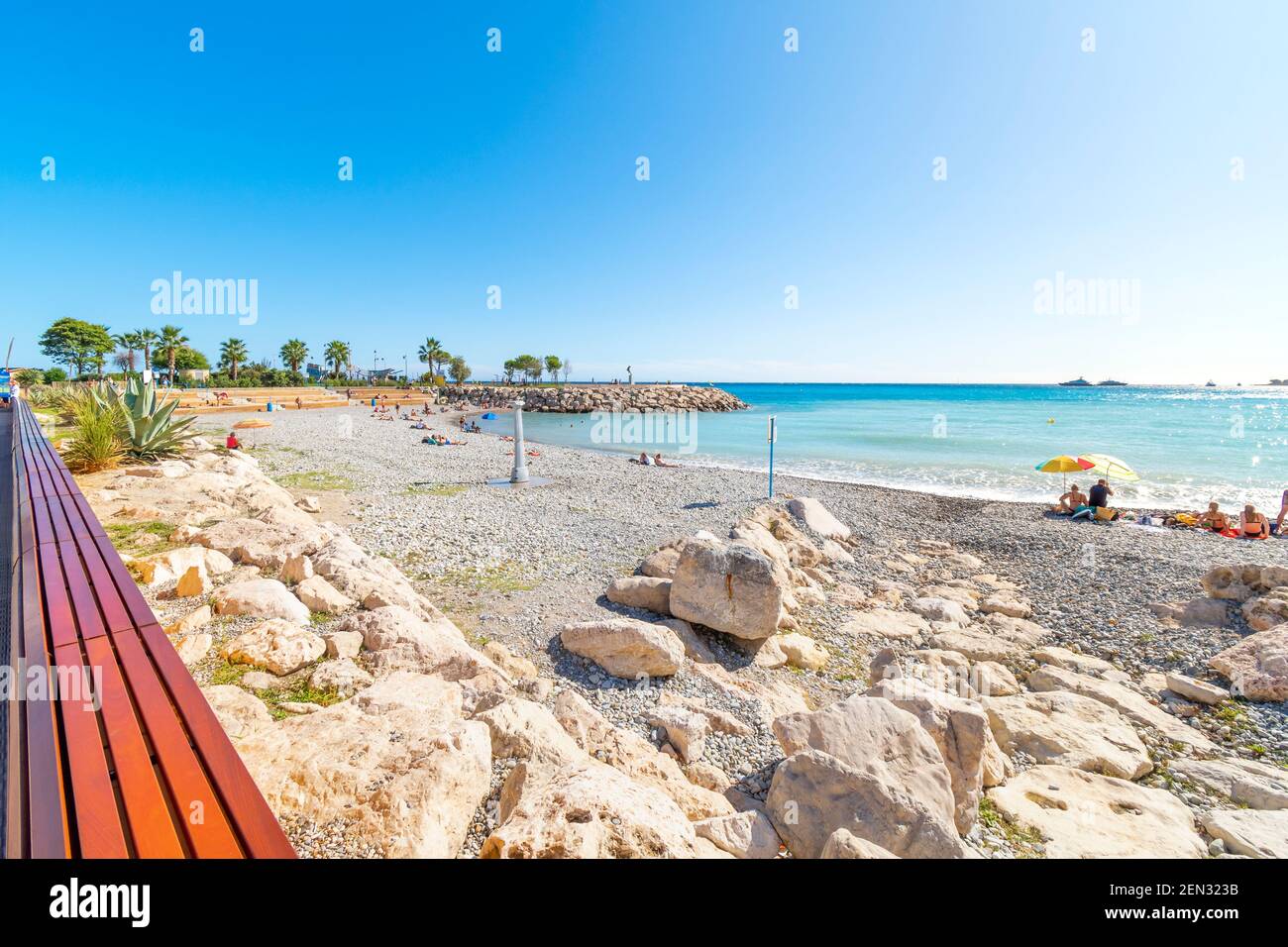 The public pebble beaches of Casino and Fossan along the French Riviera in the seaside town of Menton, France. Stock Photo