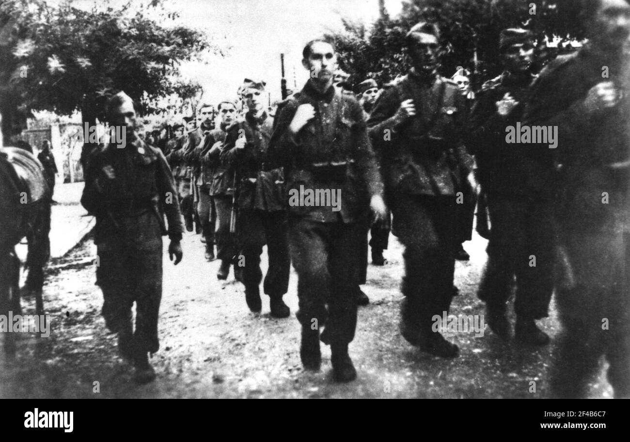 Third Yugoslav partisans' Corps marching through liberated Tuzla in October 1943 Stock Photo