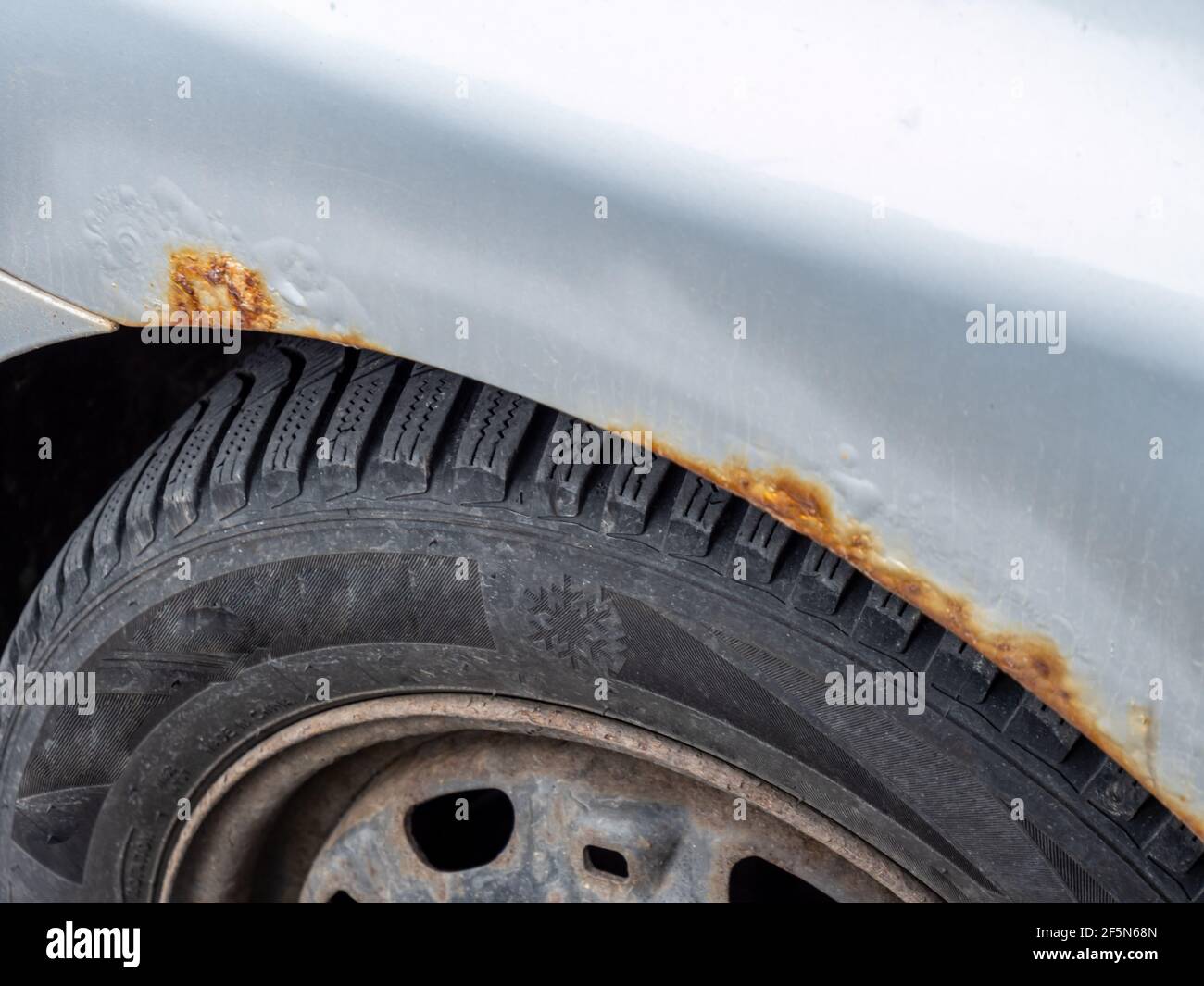 Fender starts rusting on a car Stock Photo