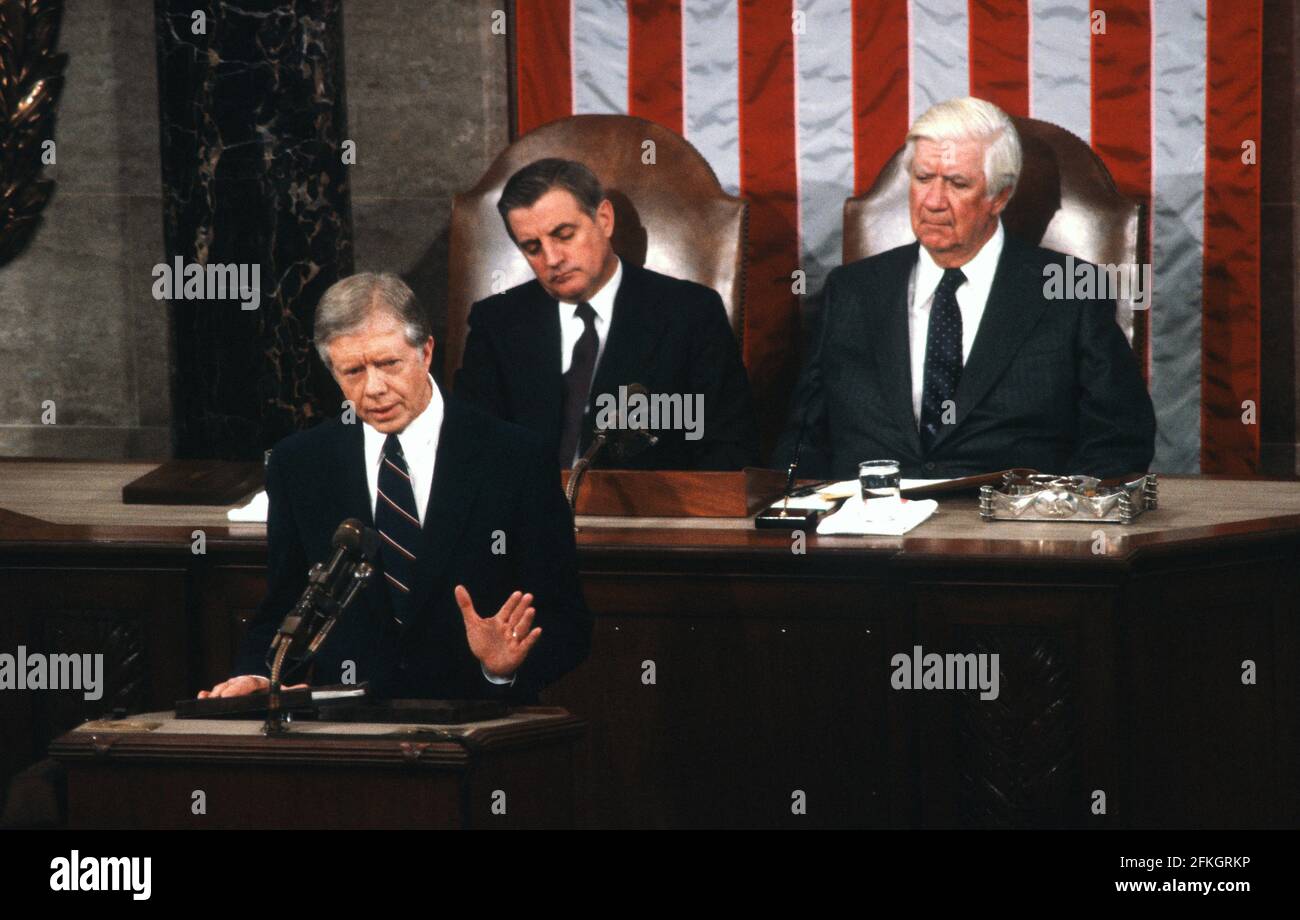 United States President Jimmy Carter addresses a Joint Session of Congress to report on the SALT II Vienna Summit following his signing a treaty between the U.S. and the U.S.S.R. on the Limitation of Strategic Offensive Arms and Related Documents with Leonid Il'ich Brezhnev, General Secretary and Member, Politburo, Communist Party of the Soviet Union Central Committee and Chairman of the Presidium of the Supreme Soviet of the United Soviet Socialist Republic (U.S.S.R.) in the US House Chamber of the US Capitol on Monday, June 18, 1979.  Sitting behind President Carter are US Vice President Wal Stock Photo