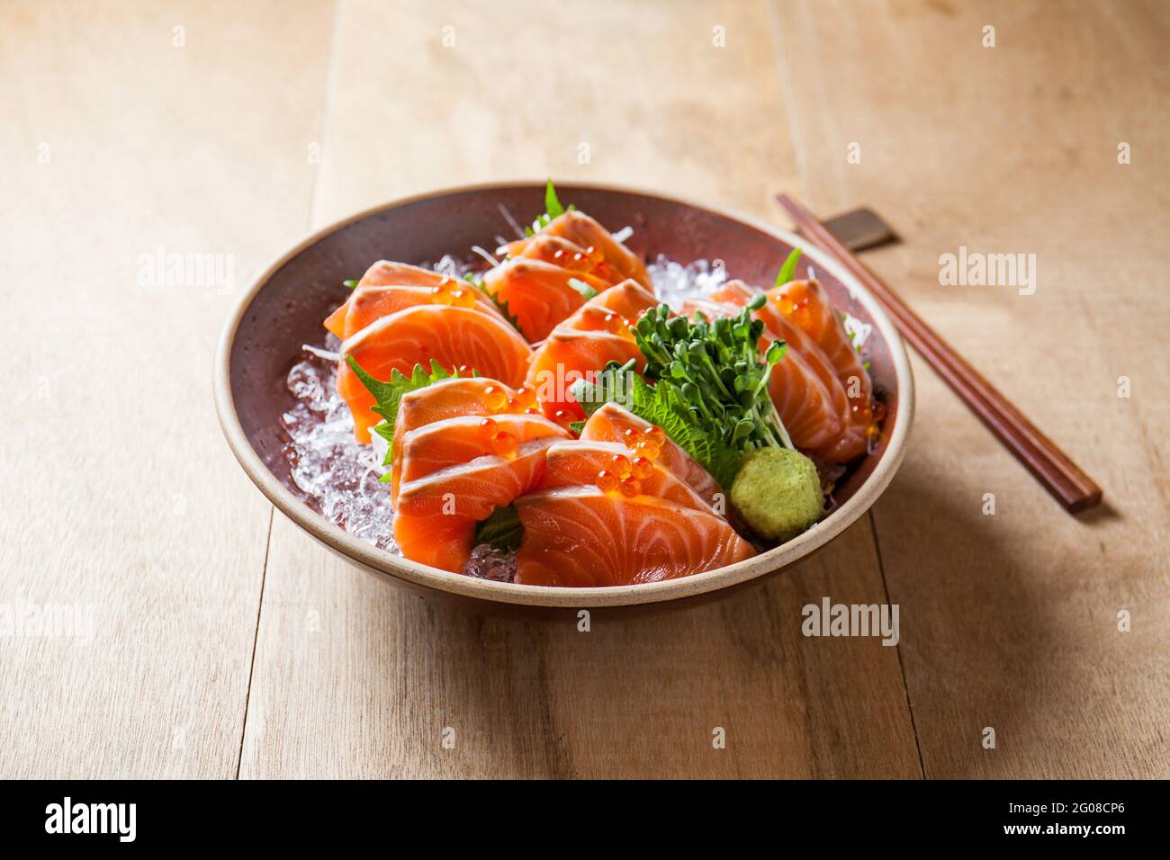 Raw salmon slice or salmon sashimi Stock Photo