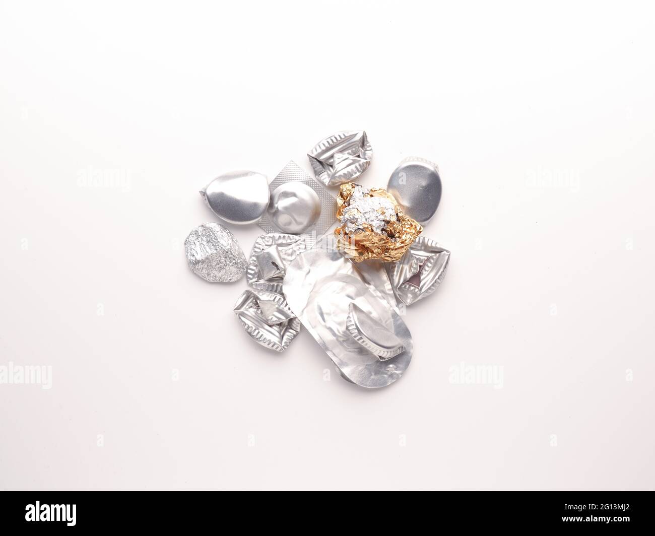 Aluminum waste on a white background, aluminum in daily use, recycling concept Stock Photo