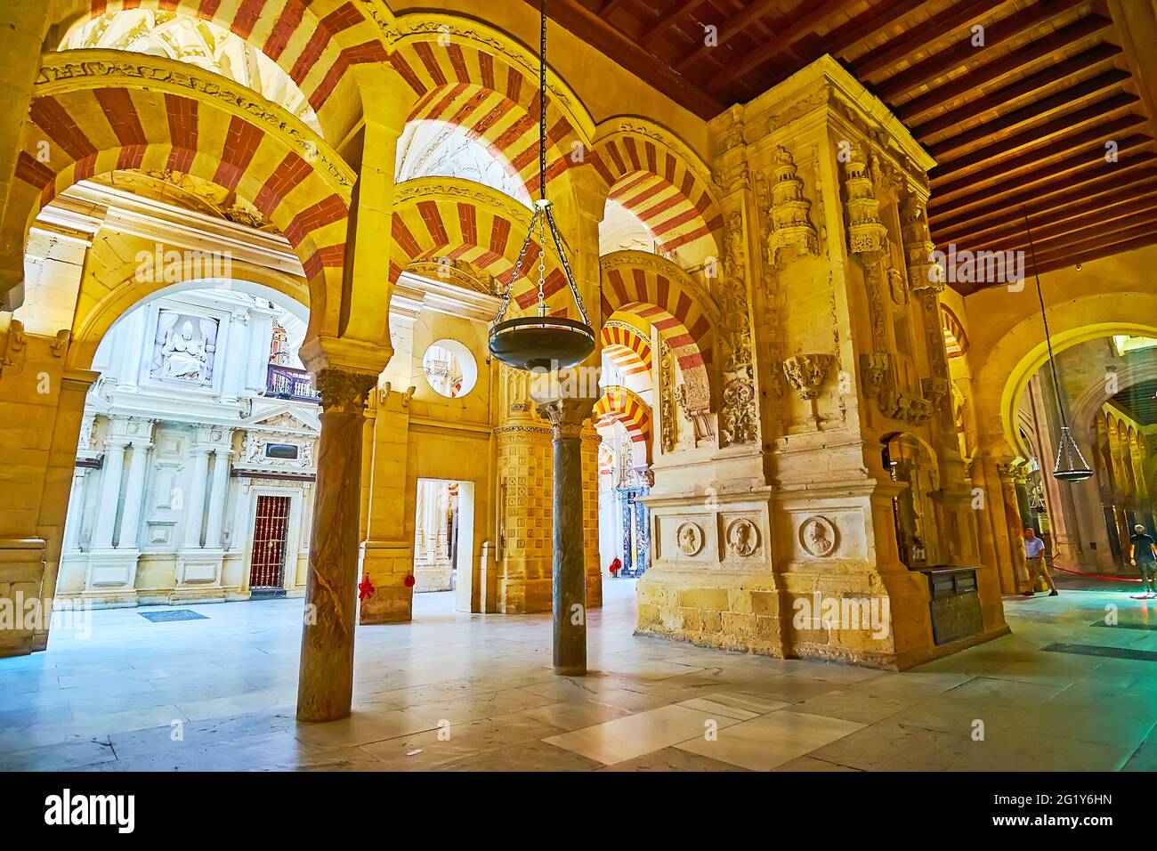 CORDOBA, SPAIN - SEP 30, 2019: The Hypostyle Hall of Mezquita-Catedral boasts boasts beautiful Moorish double arches, supported by ancient stone Roman Stock Photo