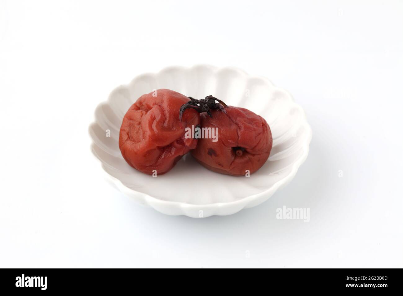 japanese pickled salt plums umeboshi isolated on white background Stock Photo