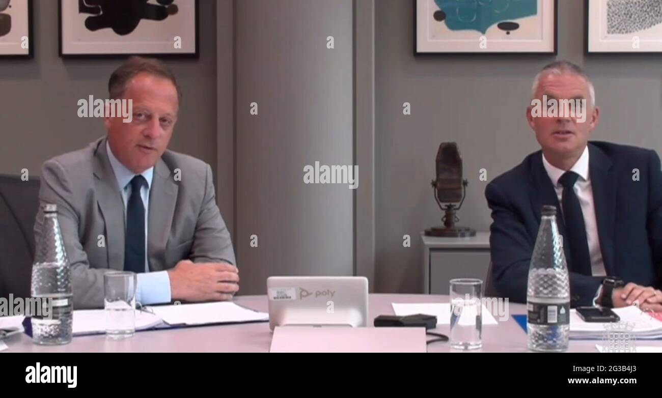 Screen grab of Chairman of the BBC, Richard Sharp (left) and current BBC Director General Tim Davie (right) answering questions, via video link, in front of the Digital, Culture, Media and Sport Committee over the handling of Martin Bashir's interview of Diana, Princess of Wales. Picture date: Tuesday June 15, 2021. Stock Photo