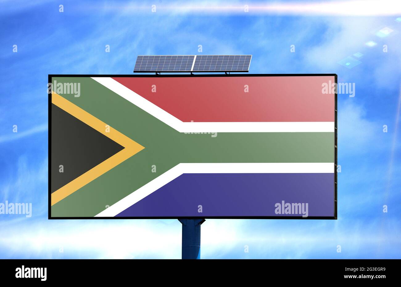 Billboard with South Africa flag and solar battery on blue sky background Stock Photo