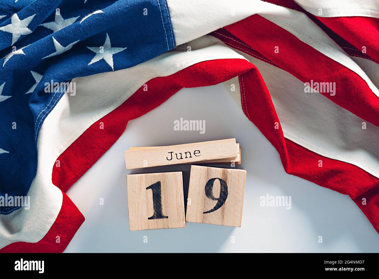 Cute wooden blocks calendar with June, 19 date. Juneteenth National Independence Day concept Stock Photo