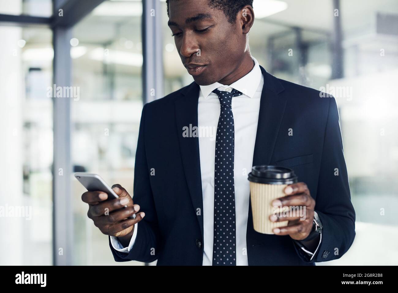 Checking up on his updates Stock Photo