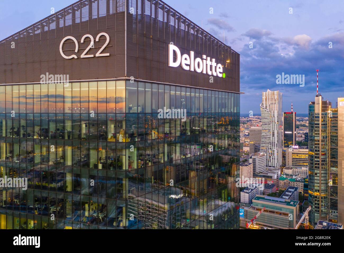 Aerial view of Q22 Deloitte office building at sunset Stock Photo