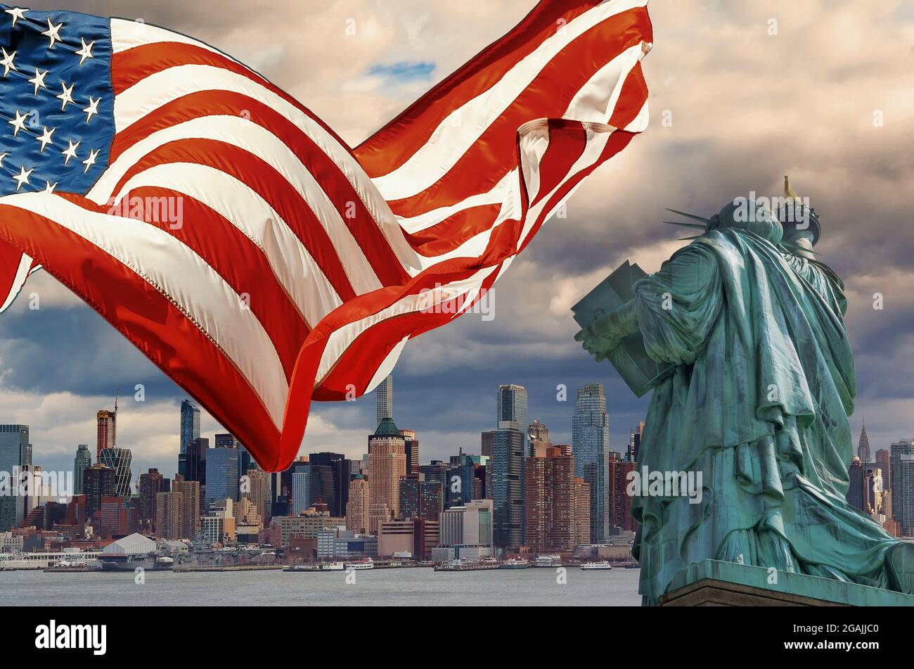 Manhattan New York City on Statue of Liberty the American Flag Stock Photo