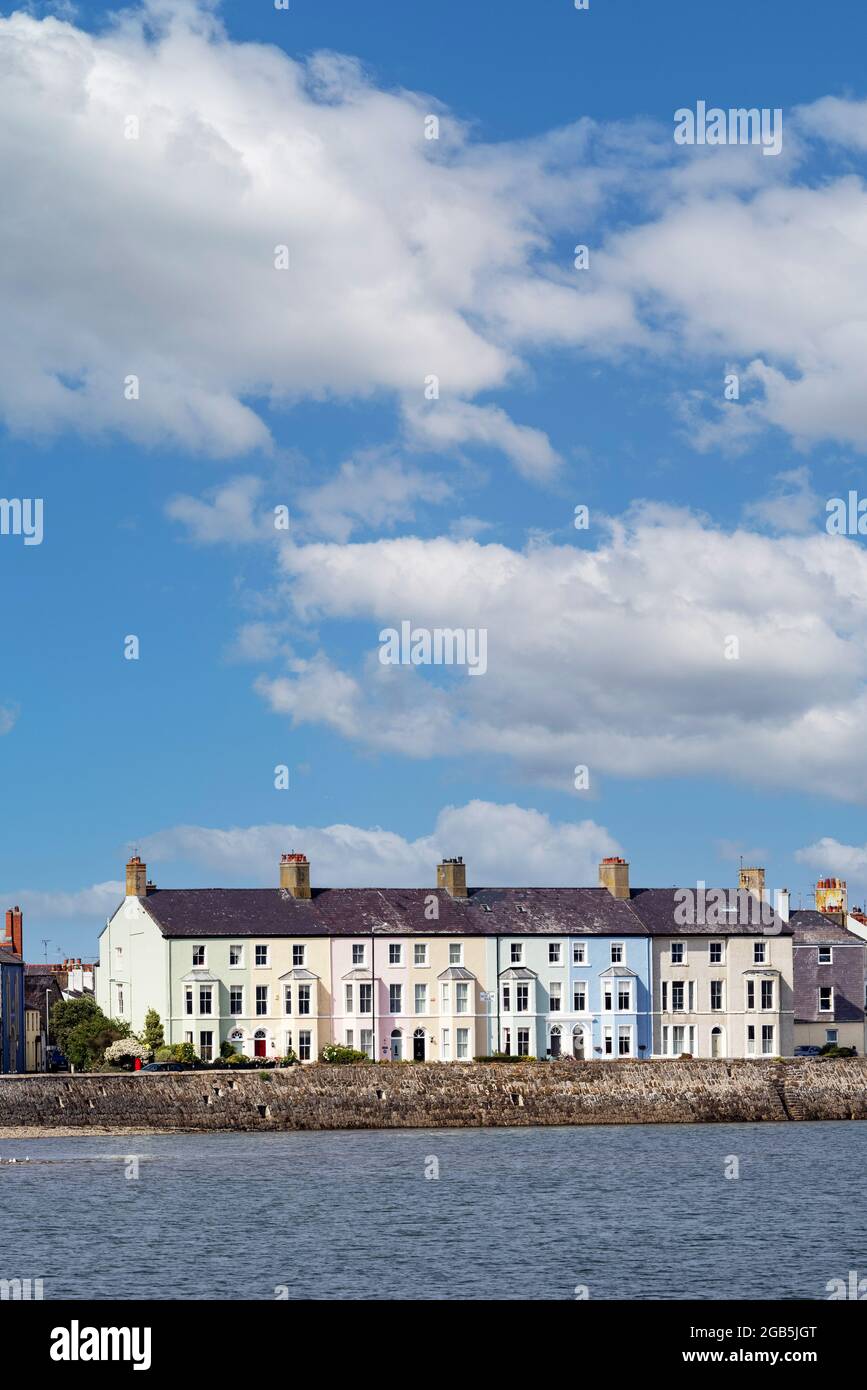 Colourful Victorian terraced houses on the coast in Beaumaris, Anglesey. The victorian terrace is known as Beaumaris West End; Anglesey Wales UK Stock Photo