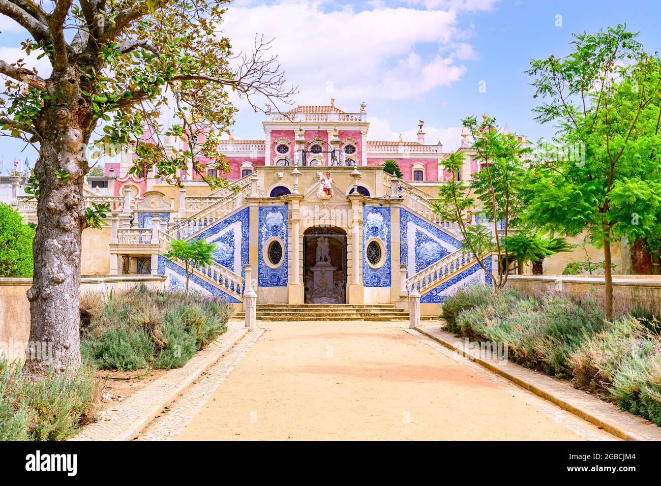 The pink Estoi palace, Palacio De Estoi a fine example of rococo architectue now part of a hotel. Estoi Algarve Portugal Stock Photo