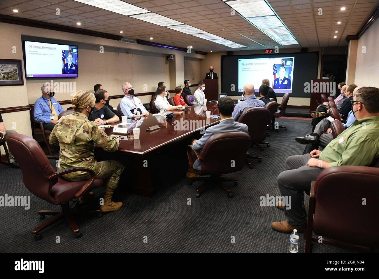 Brig. Gen. Jennifer Hammerstedt, Warner Robins Air Logistics Complex commander, receives a brief about the Joint Robotics Organization for Building Organic Technologies Summit at Robins Air Force Base, Georgia, May 5, 2021. The JROBOT group came to the WR-ALC to document the efforts made in robotics at Robins. Stock Photo