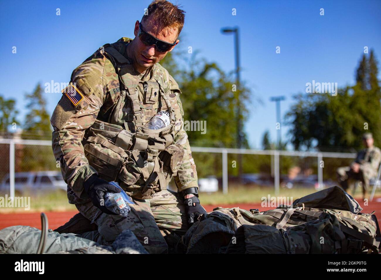 Spc. Austin Falerios, an AH-64 armament/electrical/avionic systems repairer assigned to Bravo Company, 46th Aviation Support Battalion, 16th Combat Aviation Brigade and an Atascadero, Calif., native, completes a layout during the I Corps Best Warrior Competition at Joint Base Lewis-McChord, Wash., June 9, 2021. The competition encompassed four days of grueling tasks designed to test their knowledge, physical and mental endurance, and leadership skills. Stock Photo