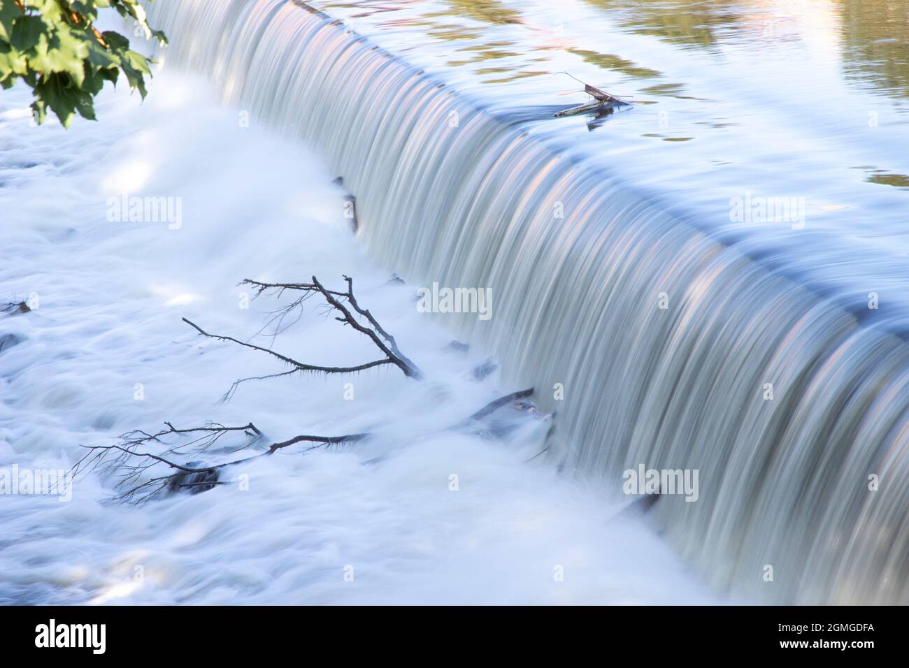 man-made waterfall on a river Stock Photo