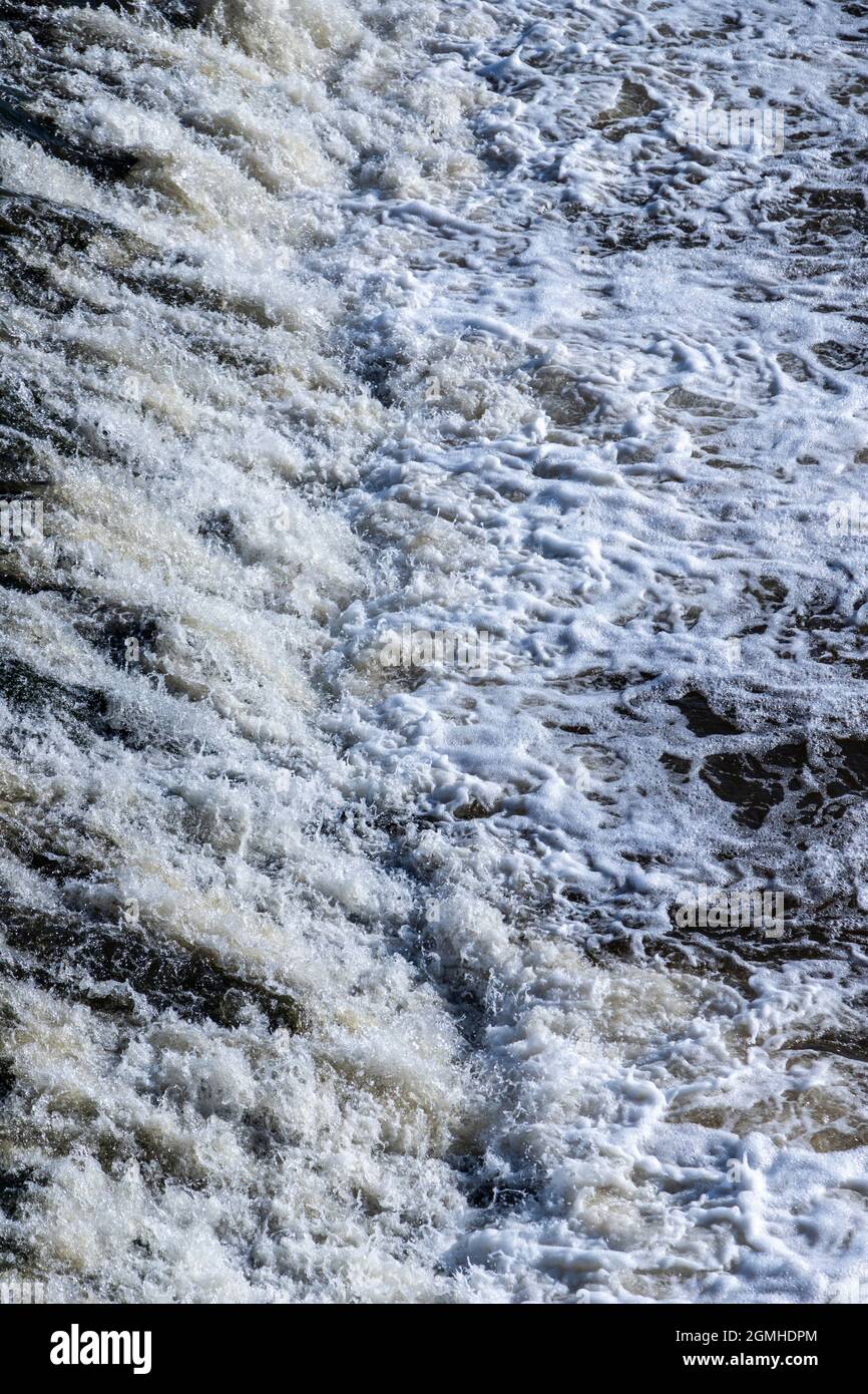 man-made waterfall on a river Stock Photo