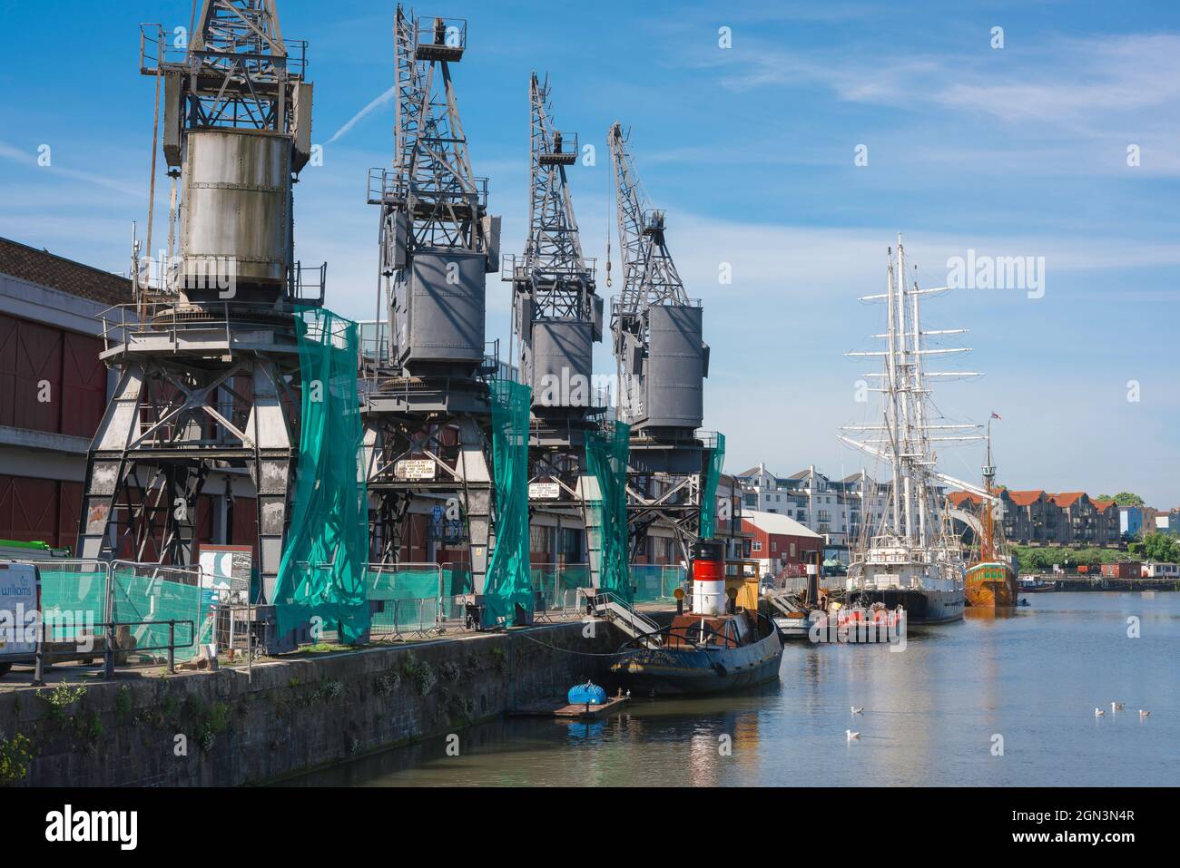 Bristol UK, view of vintage cranes sited along the quay of the historic Floating Harbour in the centre of Bristol, England, UK Stock Photo