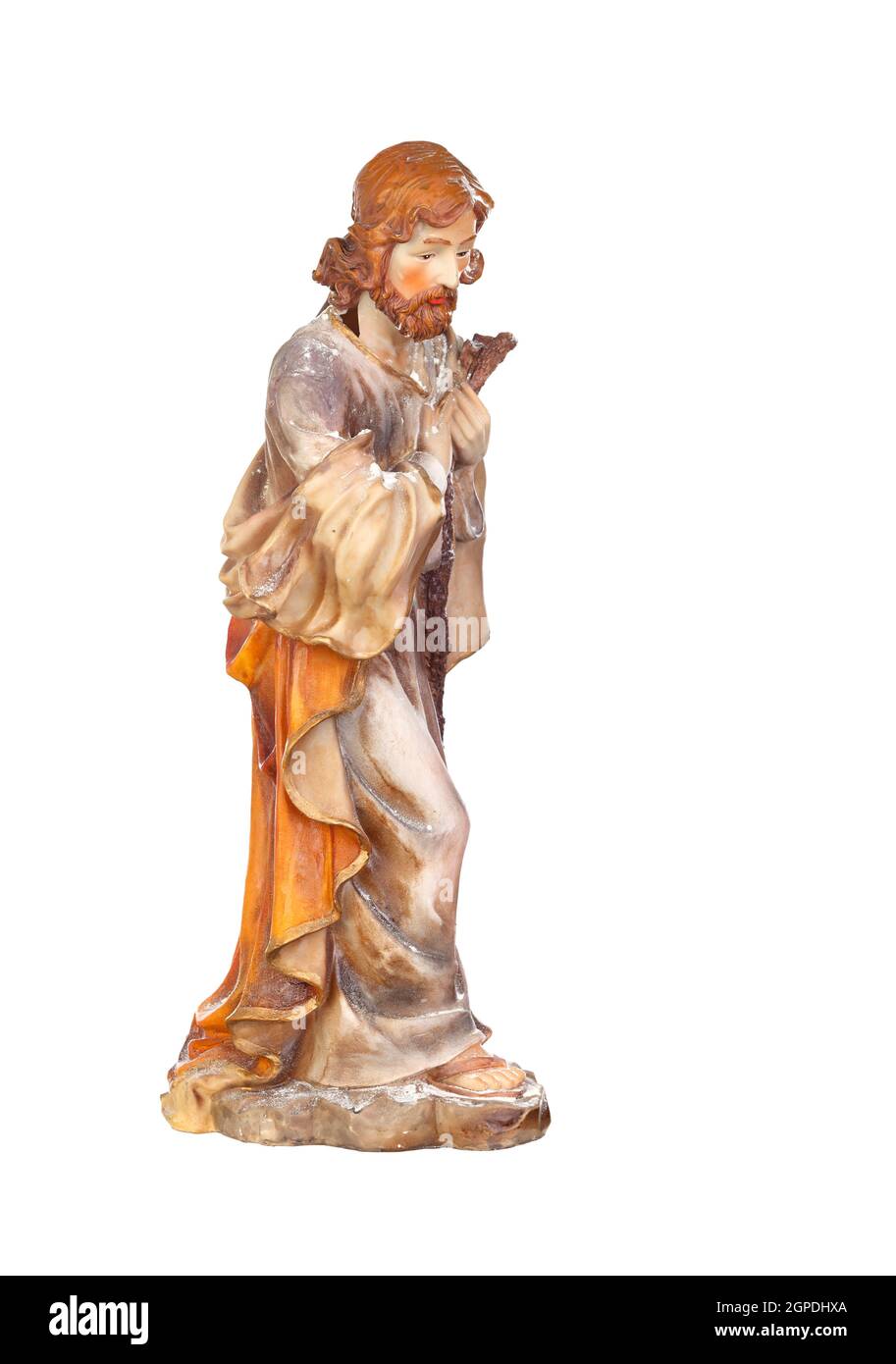 Figure of Saint Joseph of the Nativity scene isoalted on a white background Stock Photo