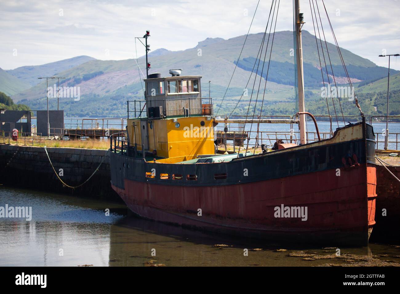 Fishing boat at harbor in Loch Fyne Stock Photo