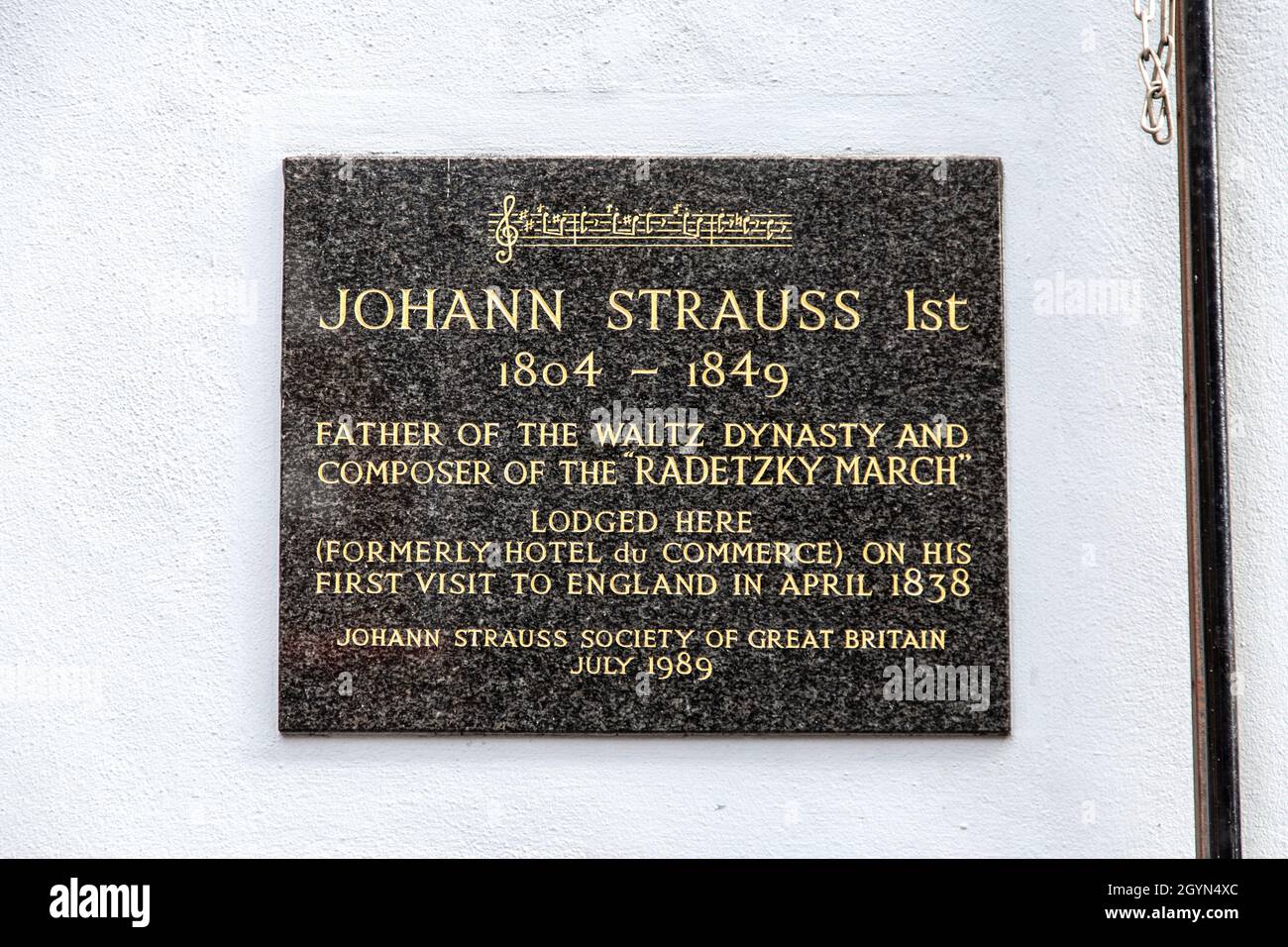 Plaque for composer Johan Strauss the First, on the facade of former Hotel du Commerce where he stayed in 1838, Soho, London, UK Stock Photo