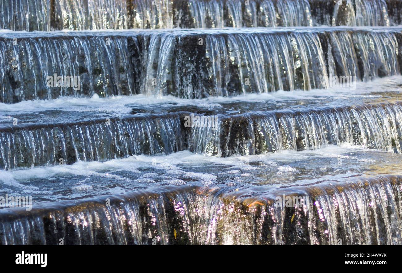 Picture Of Water Flowing Down A Man-made Waterfall. Stock Photo