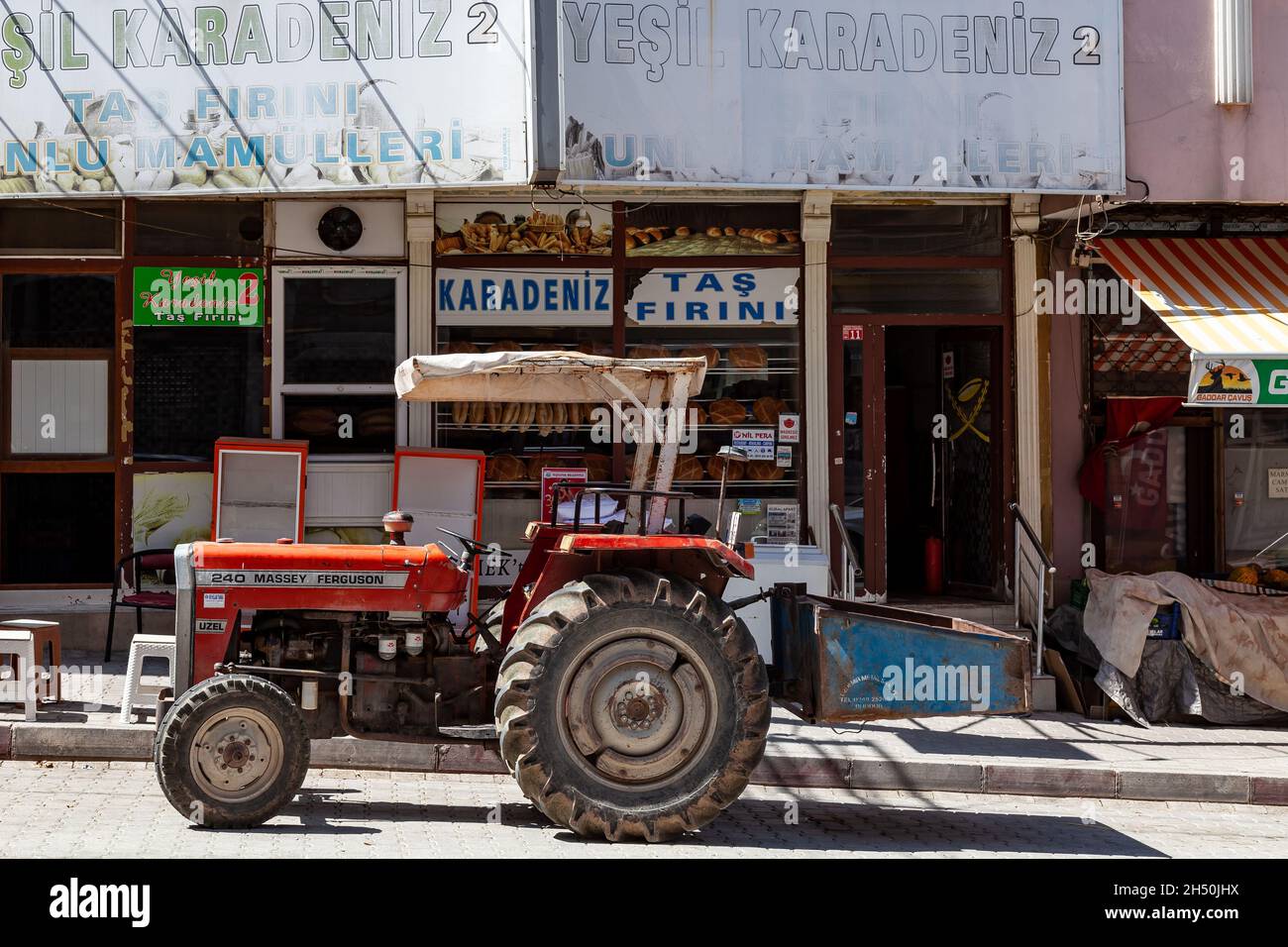 Antalya, Turkey - 08. 25. 2021: An old red tractor massey ferguson 240 in an in the country Stock Photo