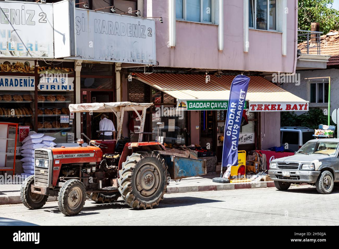 Antalya, Turkey - 08. 25. 2021: An old red tractor massey ferguson 240 in an in the country Stock Photo