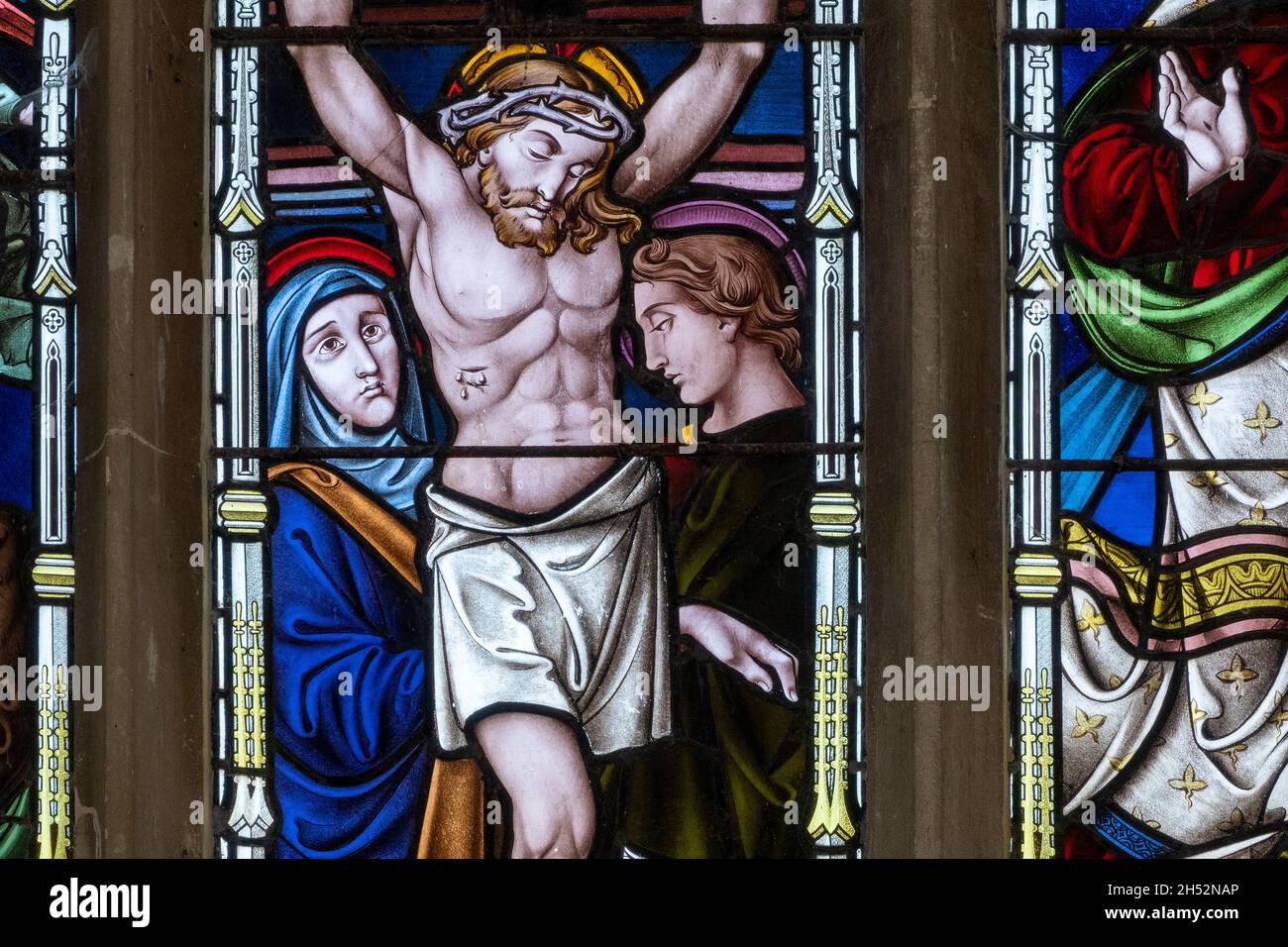 Details from a stained glass window showing Christ at St Andrew's Church Marlesford, Suffolk, UK Stock Photo