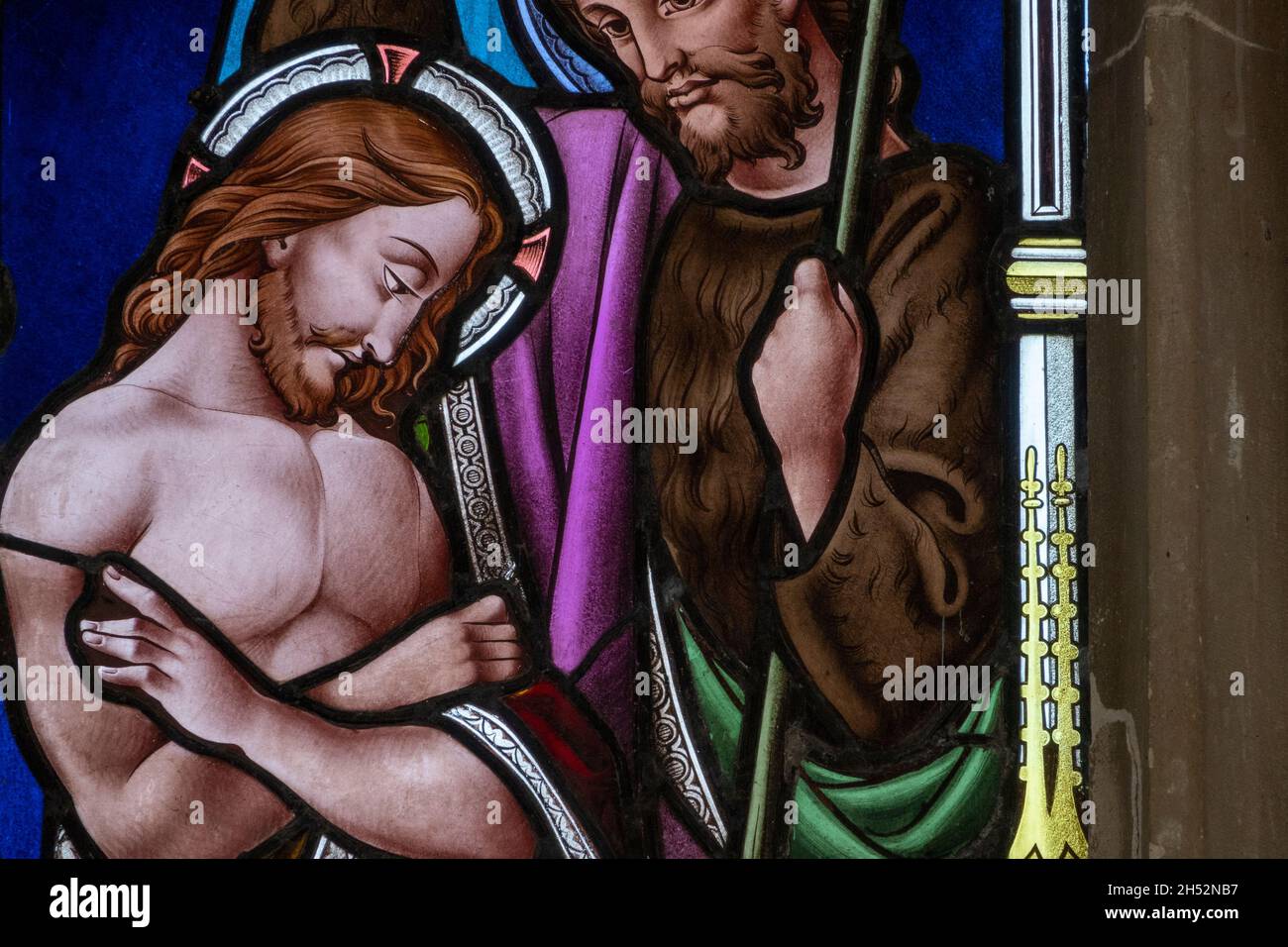 Details from a stained glass window showing Christ at St Andrew's Church Marlesford, Suffolk, UK Stock Photo