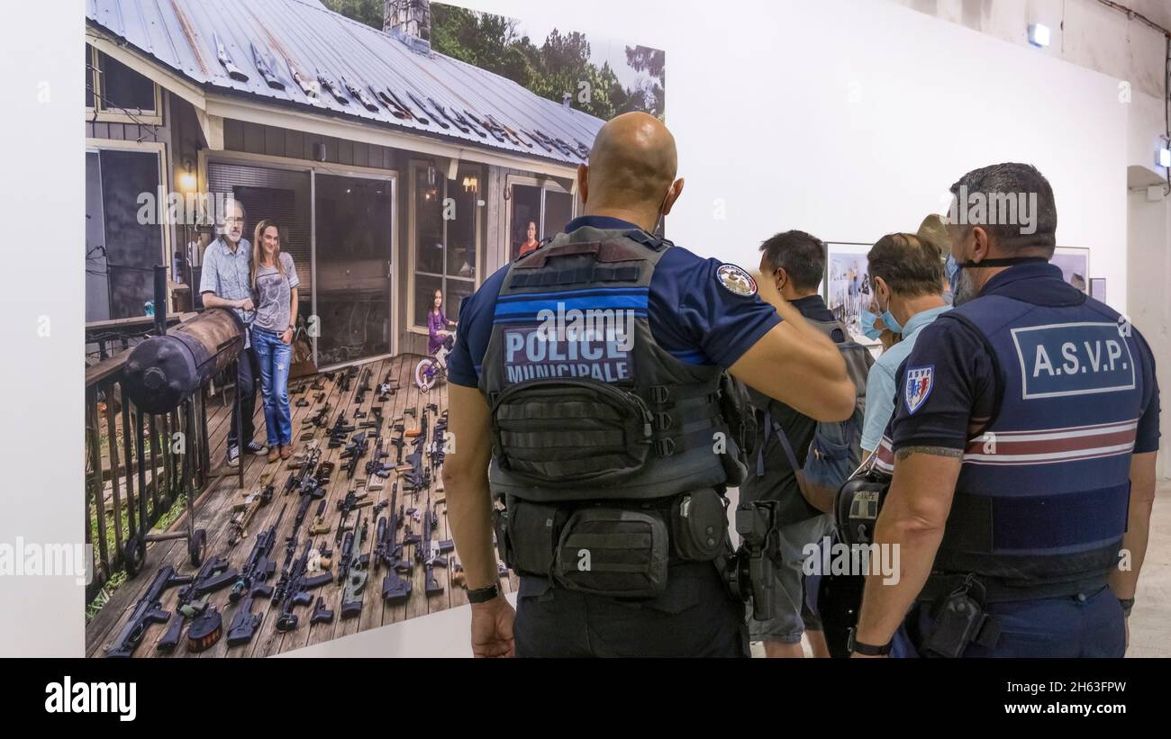 33 international photo festival in perpignan,visitors,police officers Stock Photo