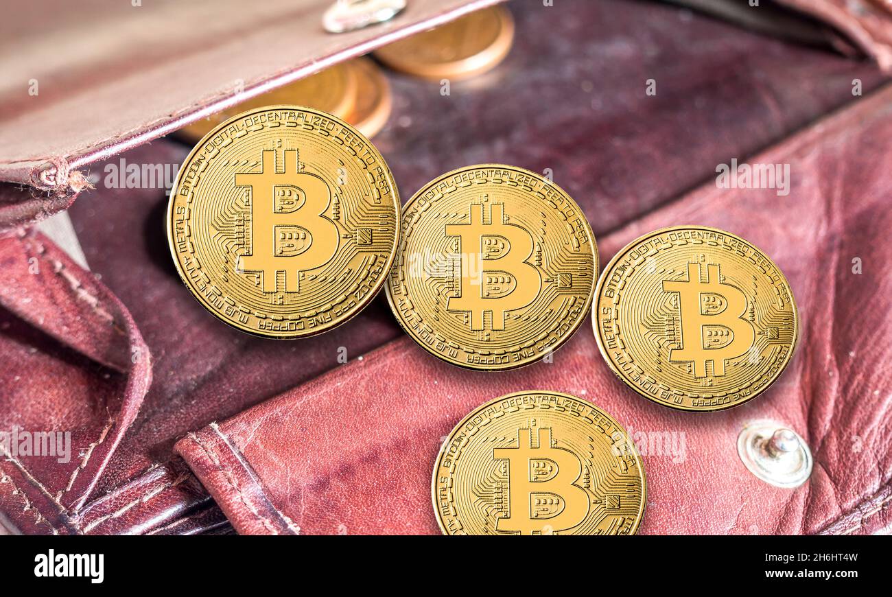 Old wallet with bitcoins symbol Stock Photo