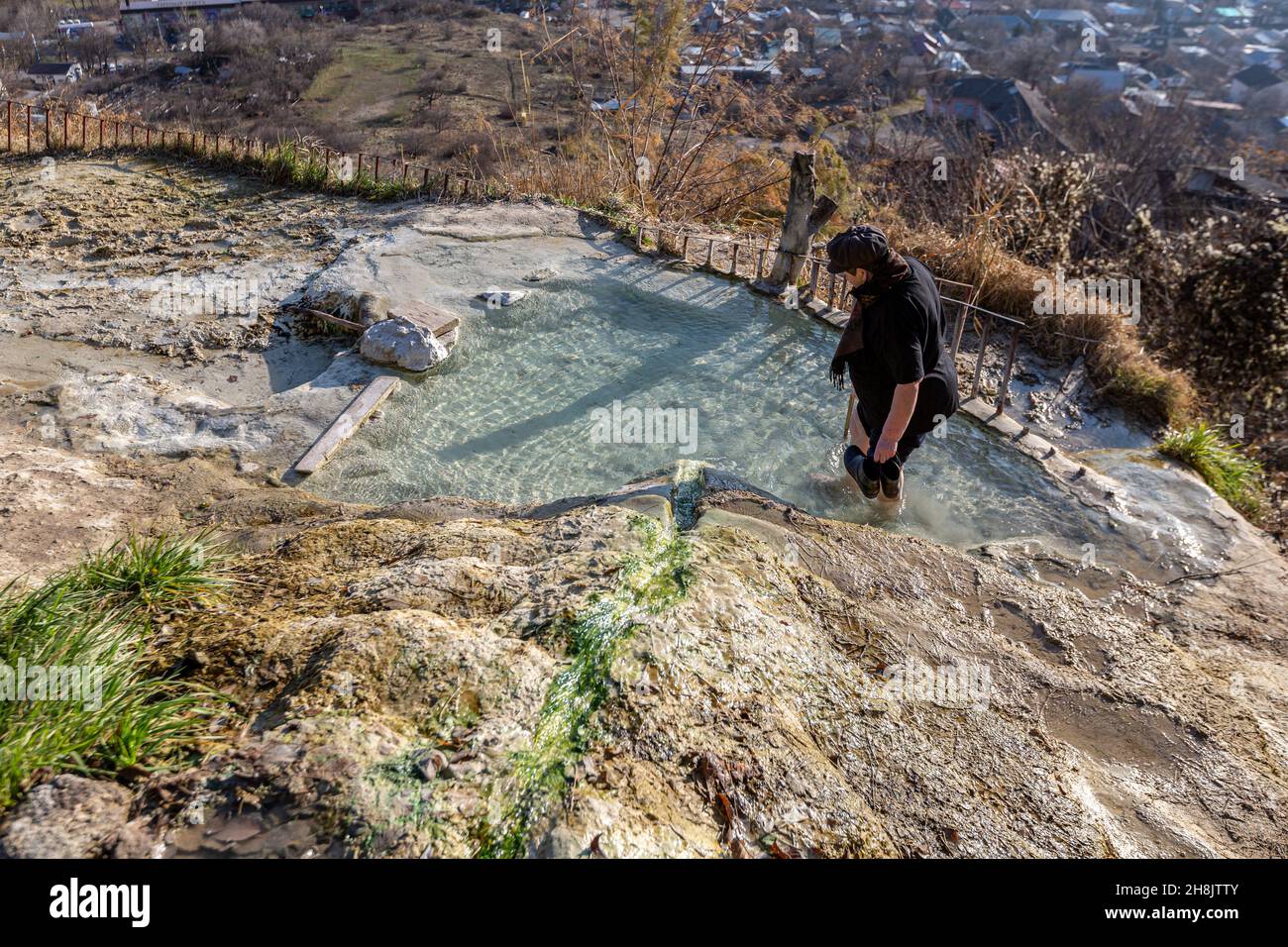 People bathe in mineral water flowing from Lake Proval in the famous resort town of Pyatigorsk Stock Photo