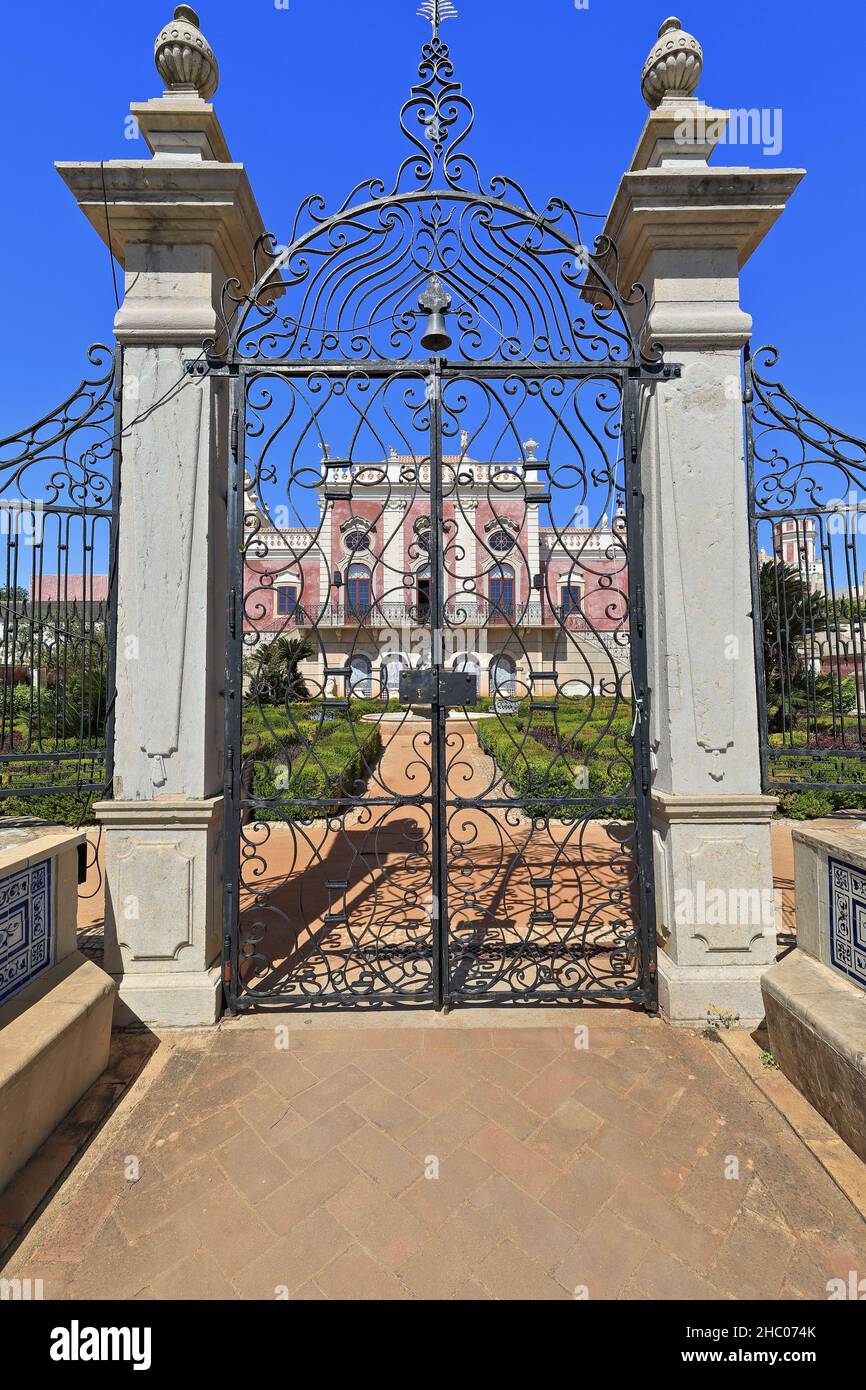 Wrought iron grill gate-formal garden-pink façade-NeoRococo Palace. Estoi-Algarve-Portugal-027 Stock Photo