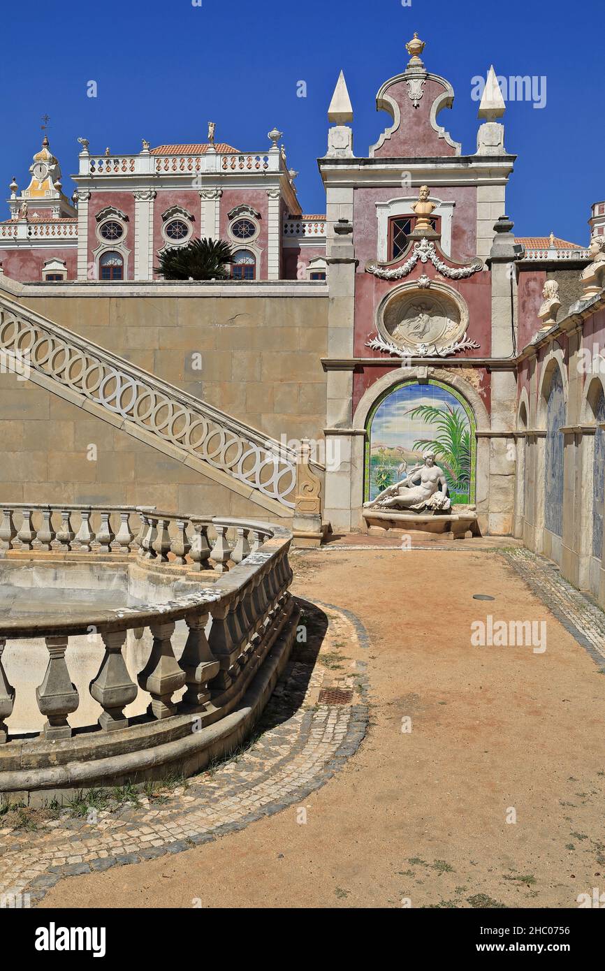 Large dry fountain basin-gravel path-stairway and nymph statue-palace façade. Estoi-Algarve-Portugal-039 Stock Photo