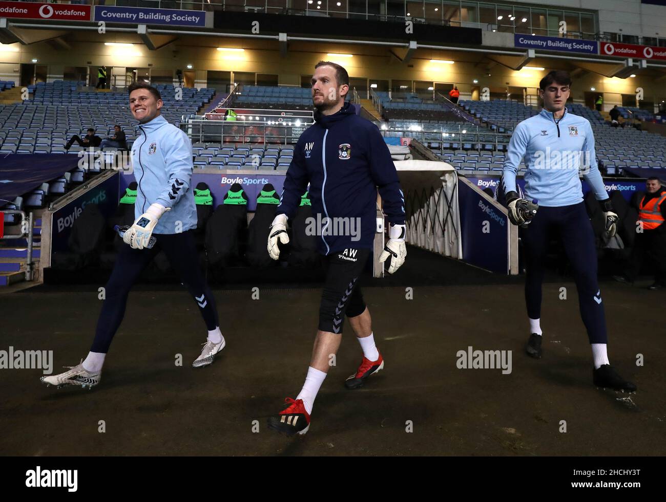 Coventry City goalkeeper Ben Wilson (left) with Cian Tyler (right) and goalkeeping coach Aled Williams before the Sky Bet Championship match at the Coventry Building Society Arena, Coventry. Picture date: Wednesday December 29, 2021. Stock Photo