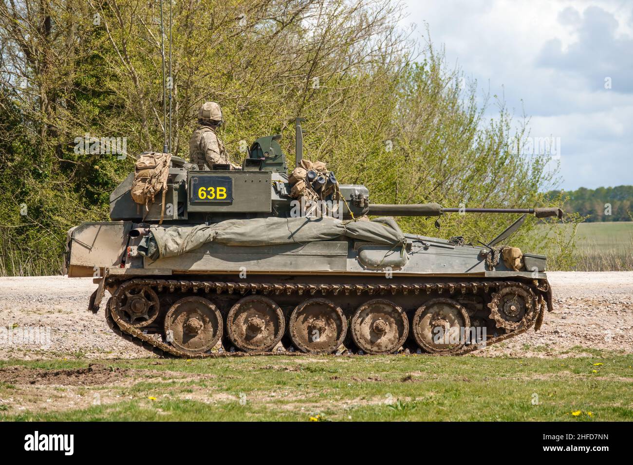 british army FV107 Scimitar armoured tracked military reconnaissance vehicle in action on a military exercise Wiltshire UK Stock Photo