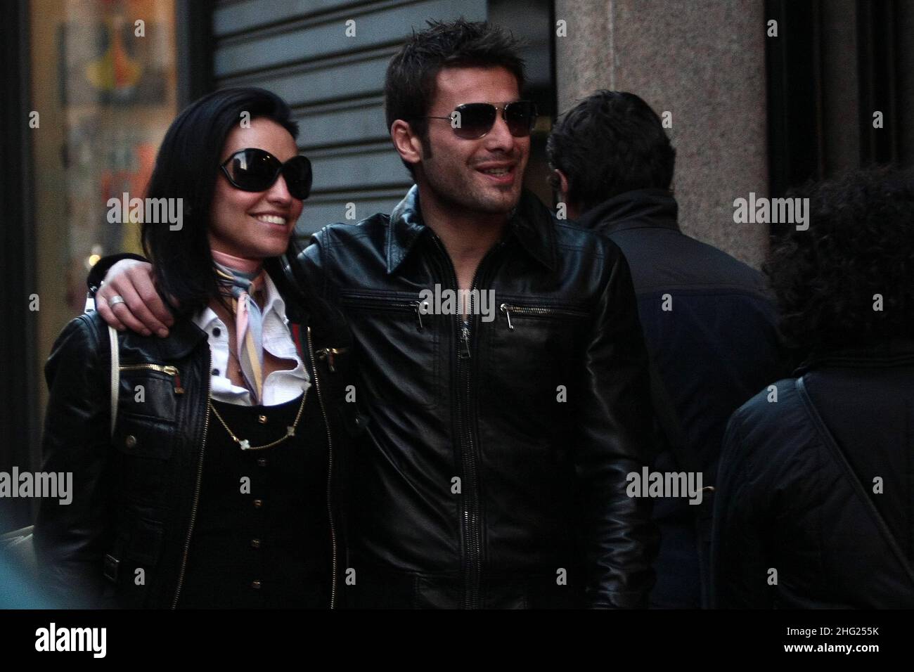 Footballer Adrian Mutu and his wife Consuelo spotted shopping in Milan, Italy. Stock Photo