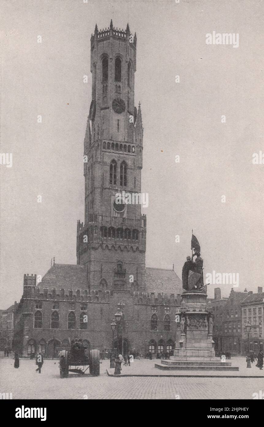 Statues of old guild-masters before the belfry of Bruges. Belgium (1923) Stock Photo