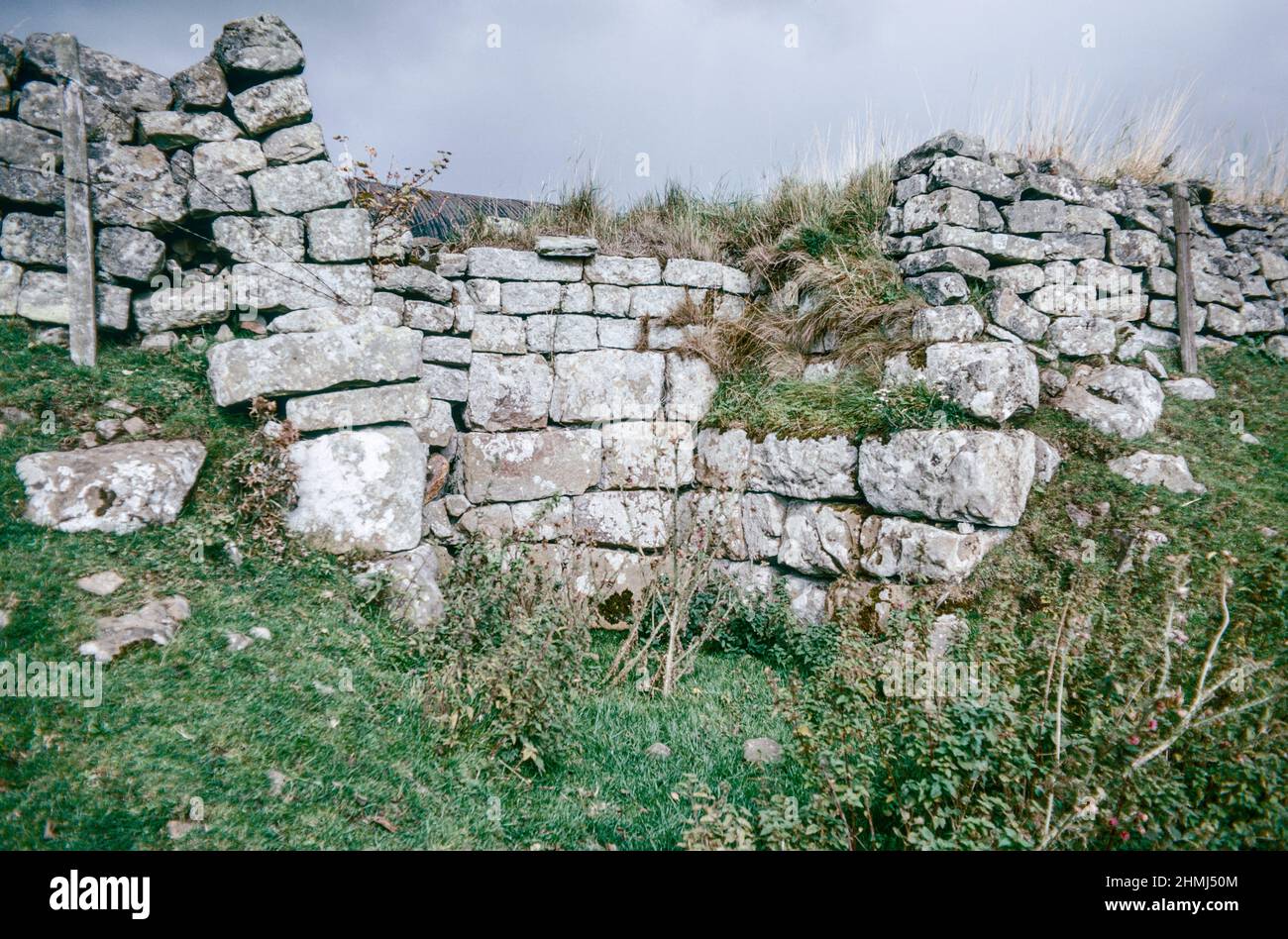 Bremenium - an ancient Roman fort (castrum) located at Rochester, Northumberland, England. The fort was one of the defensive structures built along Dere Street, a Roman road running from York to Corbridge and onwards to Melrose. Internal turret. Archival scan from a slide. October 1974. Stock Photo